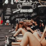 Crossfit class strap and bar training