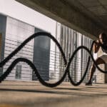 Crossfit athlete battle ropes workout