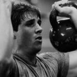 Crossfit athlete working with kettlebells